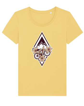 Cu bicicleta pe munte printre flori Jojoba